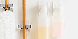 Use Command™ Hooks to secure brooms and mops
